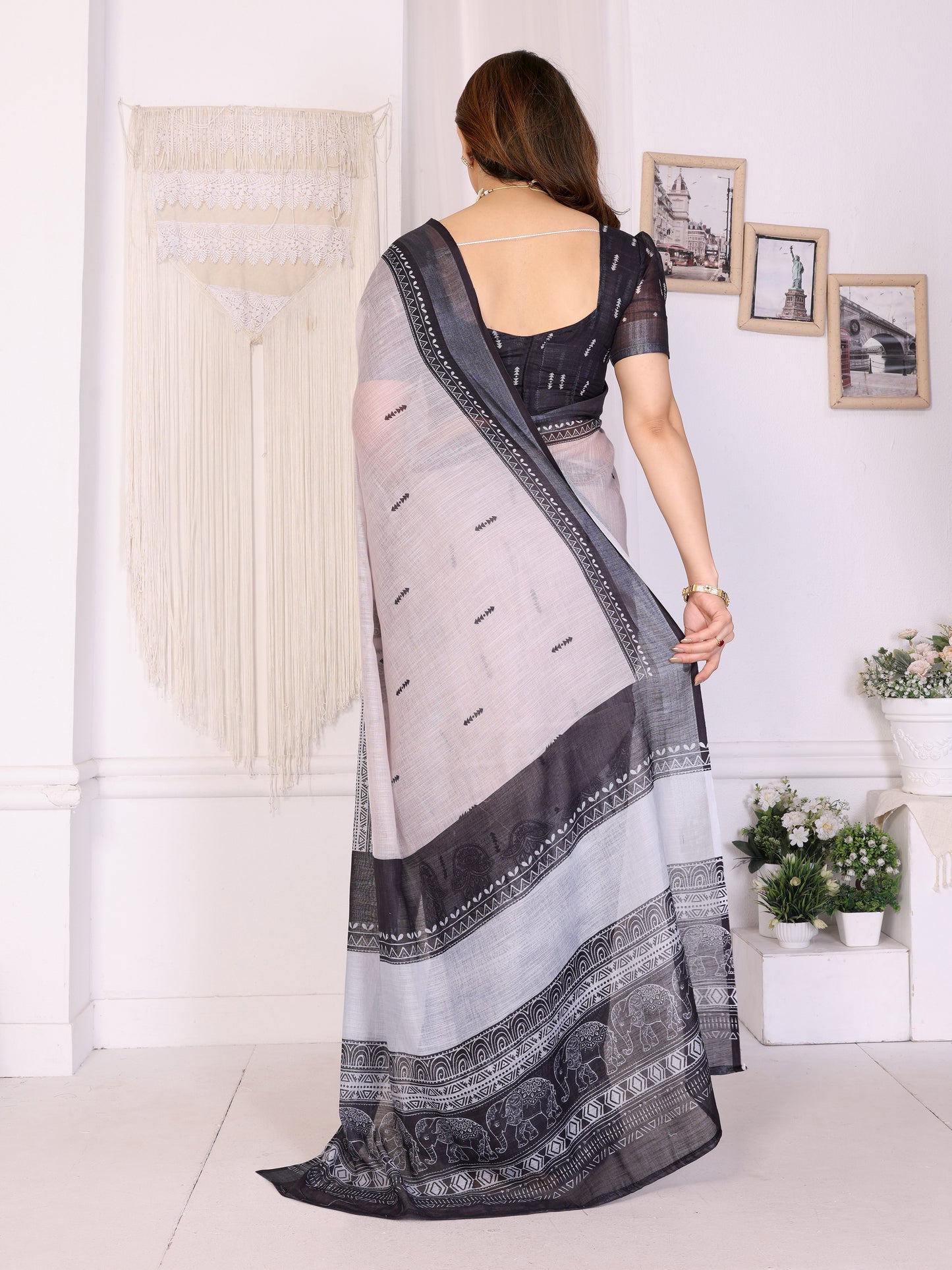 Ivory Mist Linen Cotton Saree with Classic Black Elephant Heritage Border