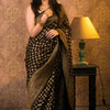 Dazzling Black Soft Banarasi Silk Saree With Gleaming Blouse Piece