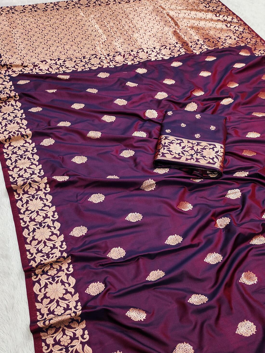 Ideal Wine Soft Banarasi Silk Saree With Denouement Blouse Piece