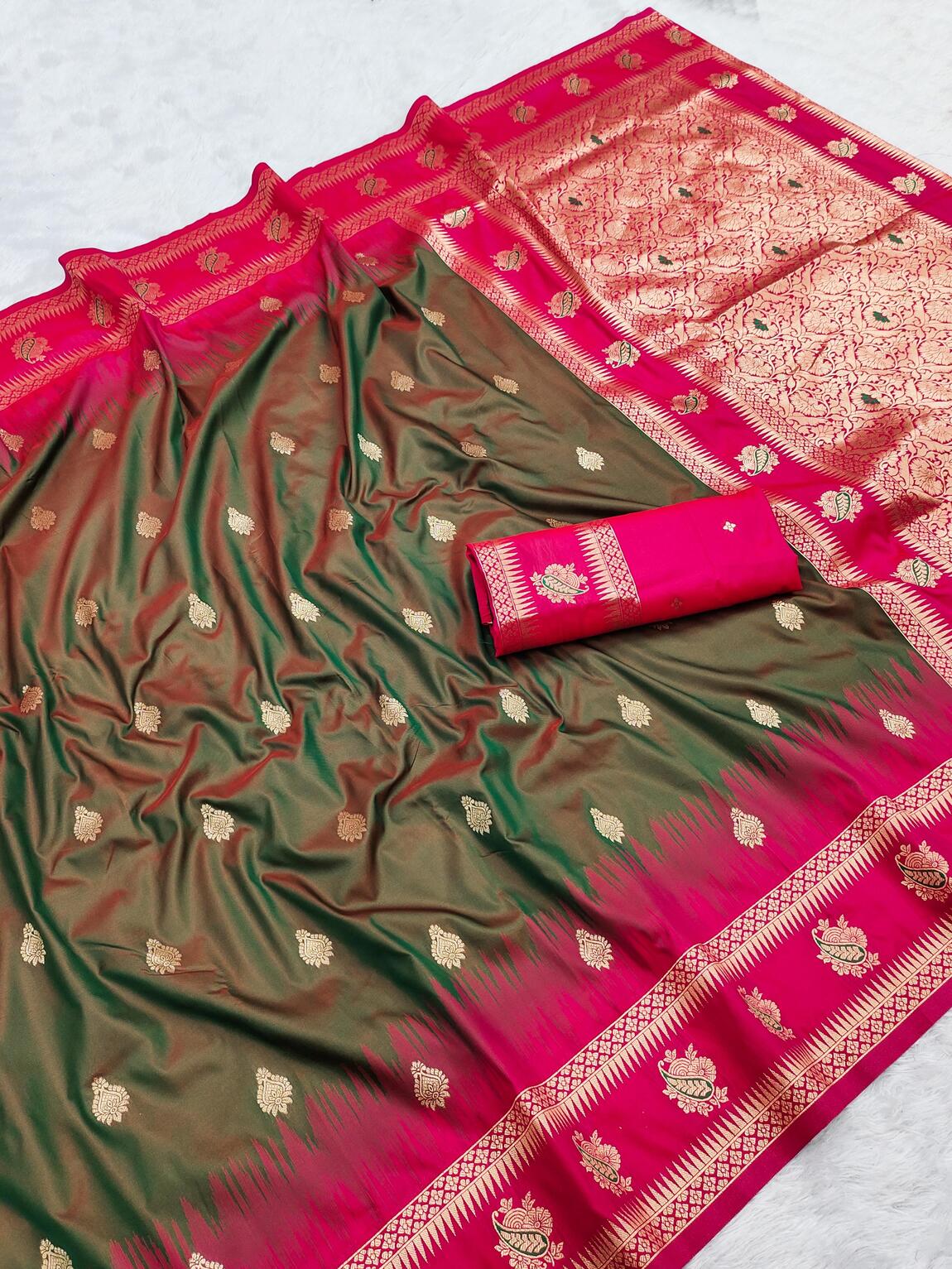 Surpassing Green Soft Banarasi Silk Saree With Zephyr Blouse Piece