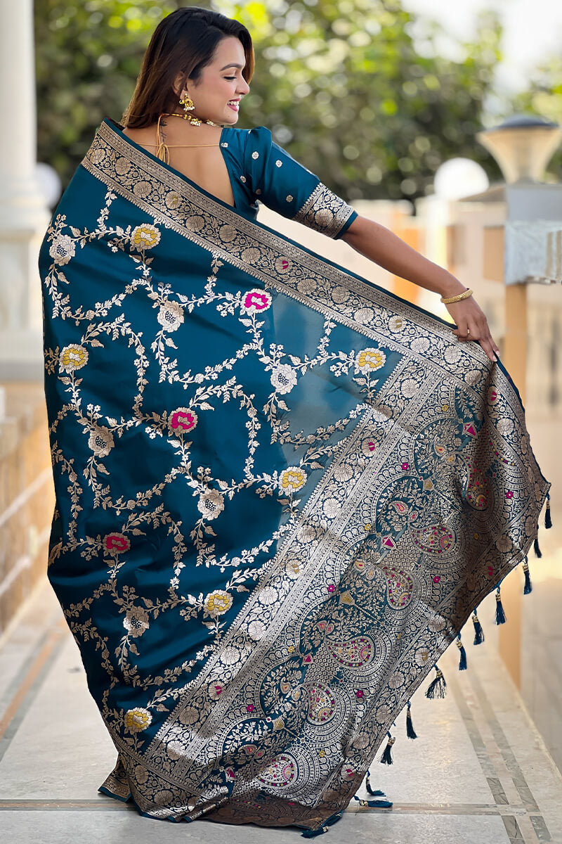 Effulgent Teal Blue Soft Banarasi Silk Saree With Embellished Blouse Piece