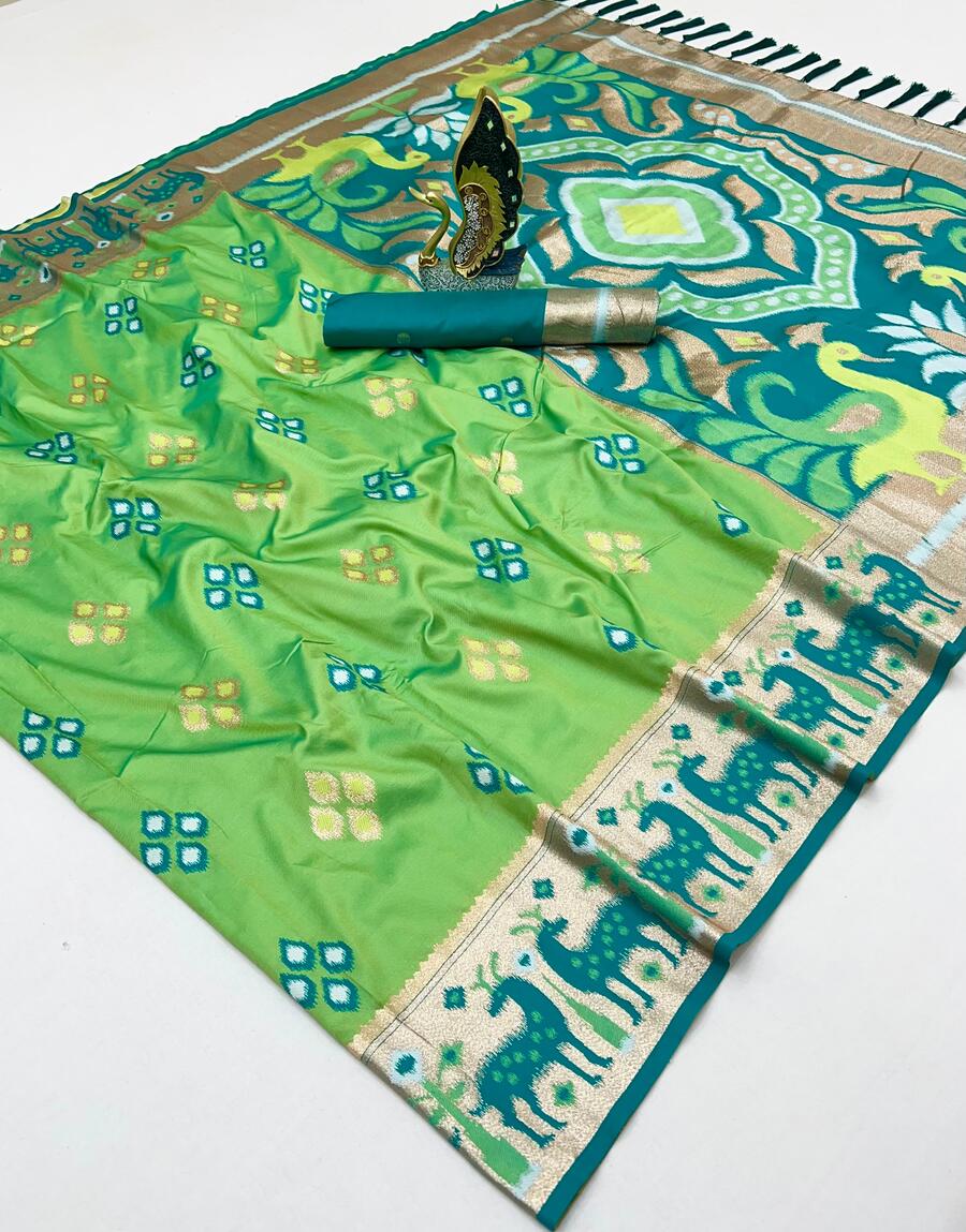 Appealing Sea Green Soft Banarasi Ikkat Saree With Nemesis Blouse Piece