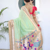 Prominent Pista Paithani Silk Saree With Radiant Blouse Piece