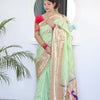 Prominent Pista Paithani Silk Saree With Radiant Blouse Piece