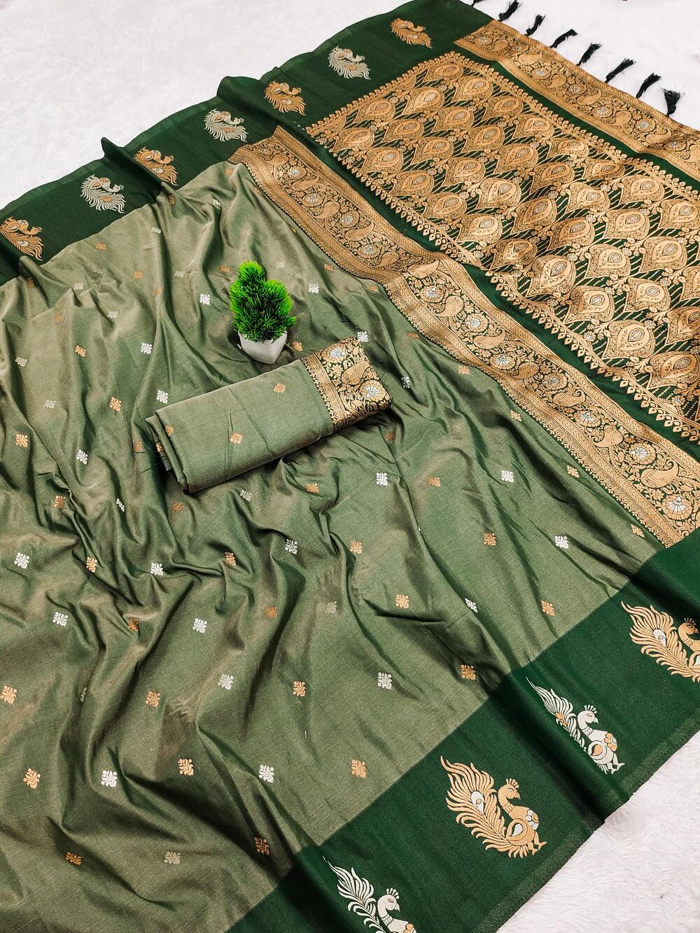 Evanescent Dark Green Soft Banarasi Silk Saree With Blooming Blouse Piece
