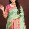 Lustrous Pista Soft Banarasi Silk Saree With Enamoring Blouse Piece
