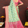Lustrous Pista Soft Banarasi Silk Saree With Enamoring Blouse Piece