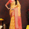 Enigmatic Yellow Soft Banarasi Silk Saree With Snappy Blouse Piece
