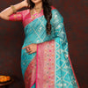 Lovely Firozi Soft Banarasi Silk Saree With Adorning Blouse Piece