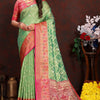 Twirling Pista Soft Banarasi Silk Saree With Traditional Blouse Piece