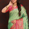 Twirling Pista Soft Banarasi Silk Saree With Traditional Blouse Piece