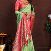Twirling Pista Soft Banarasi Silk Saree With Traditional Blouse Piece