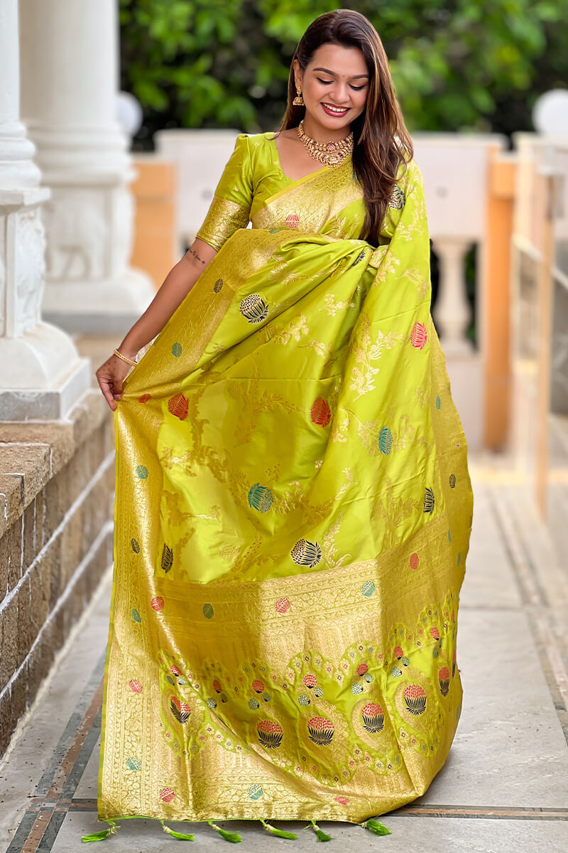 Flamboyant Parrot Soft Banarasi Silk Saree With Precious Blouse Piece