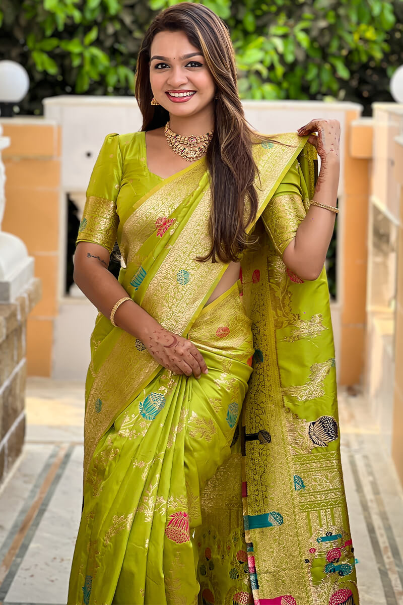 Flamboyant Parrot Soft Banarasi Silk Saree With Precious Blouse Piece