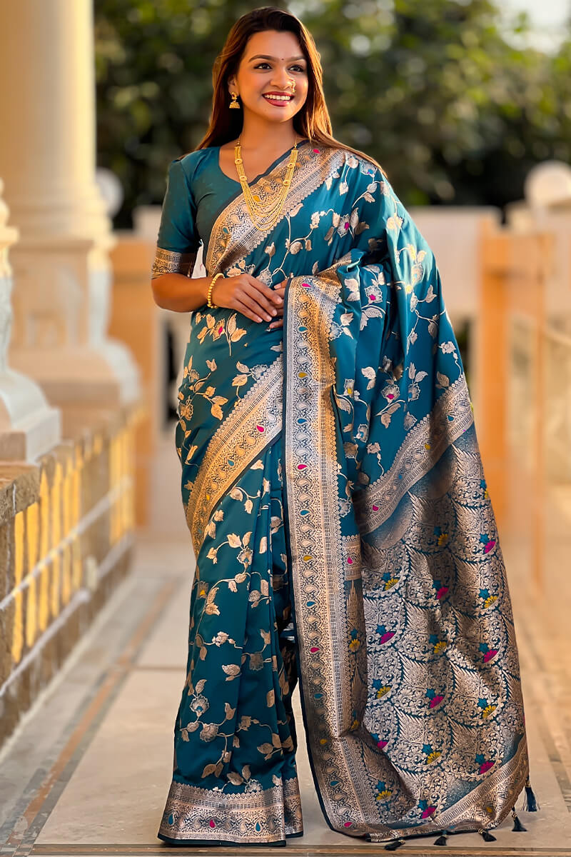 Ineffable Teal Blue Soft Banarasi Silk Saree With Zephyr Blouse Piece