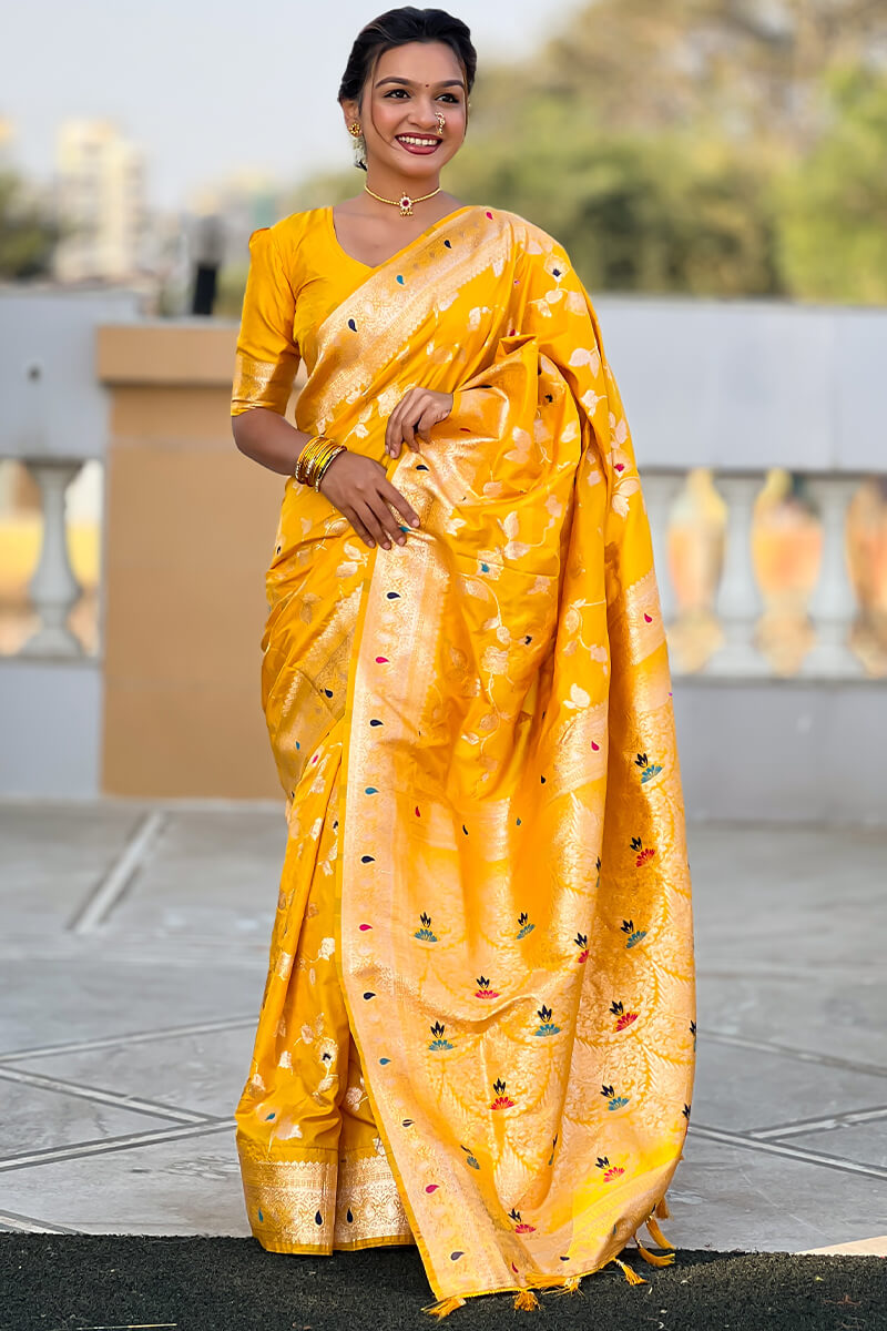 Opulent Yellow Soft Banarasi Silk Saree With Diaphanous Blouse Piece