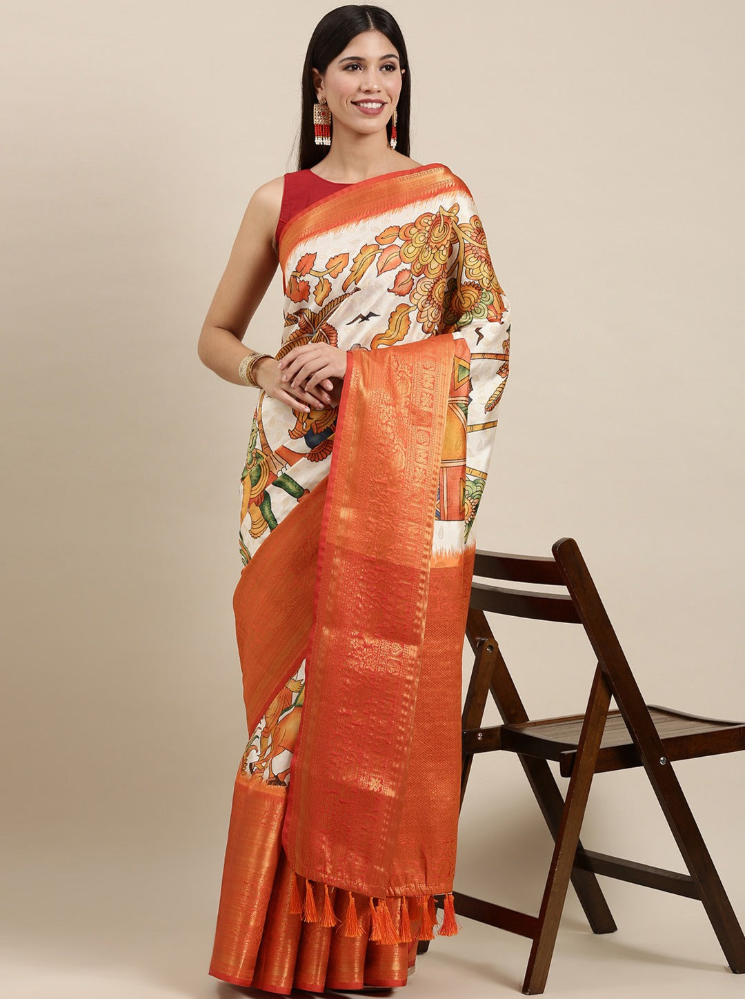 Ravishing Beige Kalamkari Printed Saree With Flameboyant Blouse Piece