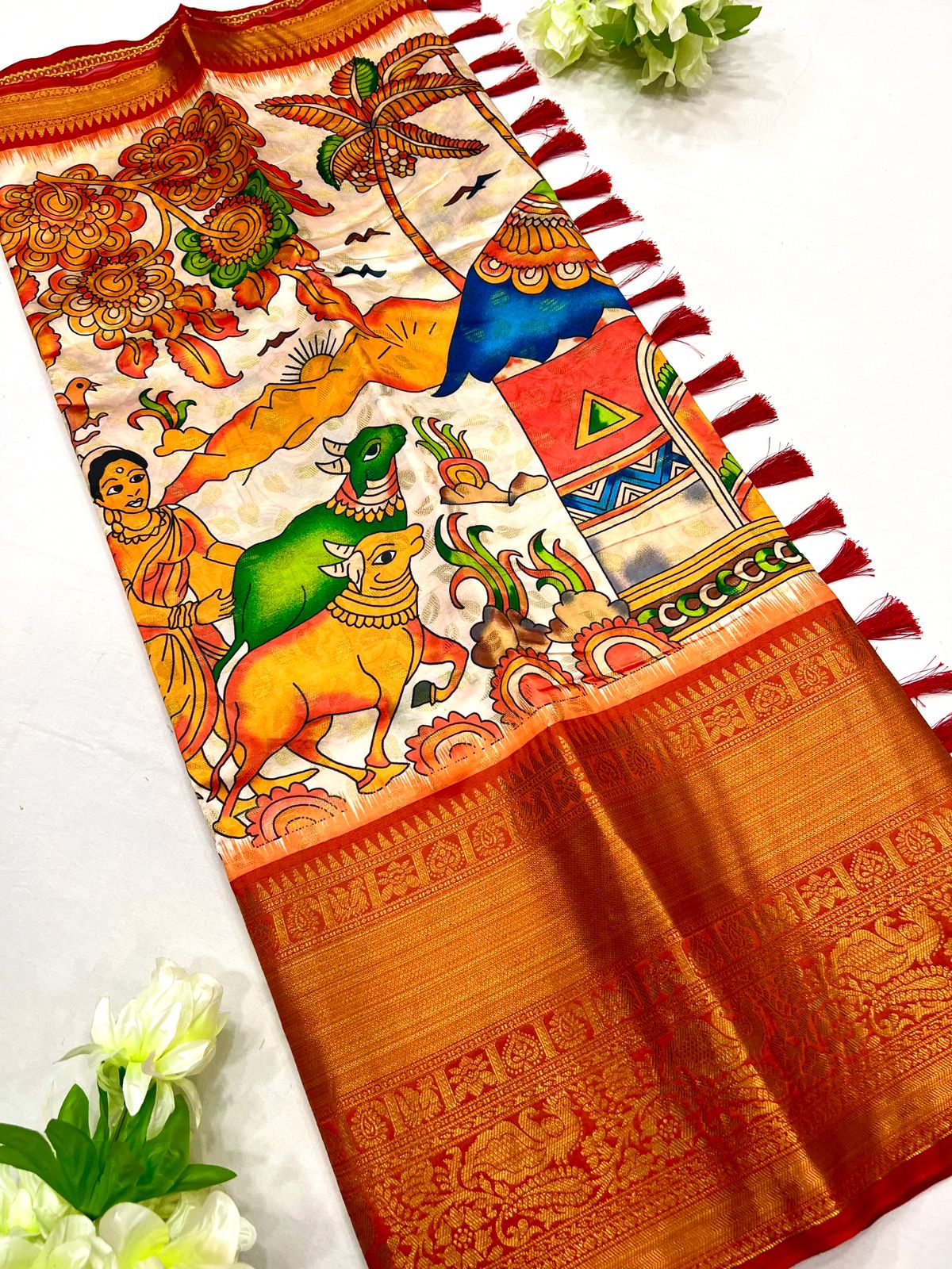 Ravishing Beige Kalamkari Printed Saree With Flameboyant Blouse Piece