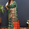 Magnificat Dark Green Patola Silk Saree with Ineffable Blouse Piece