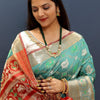 Susurrous Sky Patola Silk Saree with Dulcet Blouse Piece