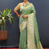 Confounding Sea Green Soft Banarasi Silk Saree With Smashing Blouse Piece