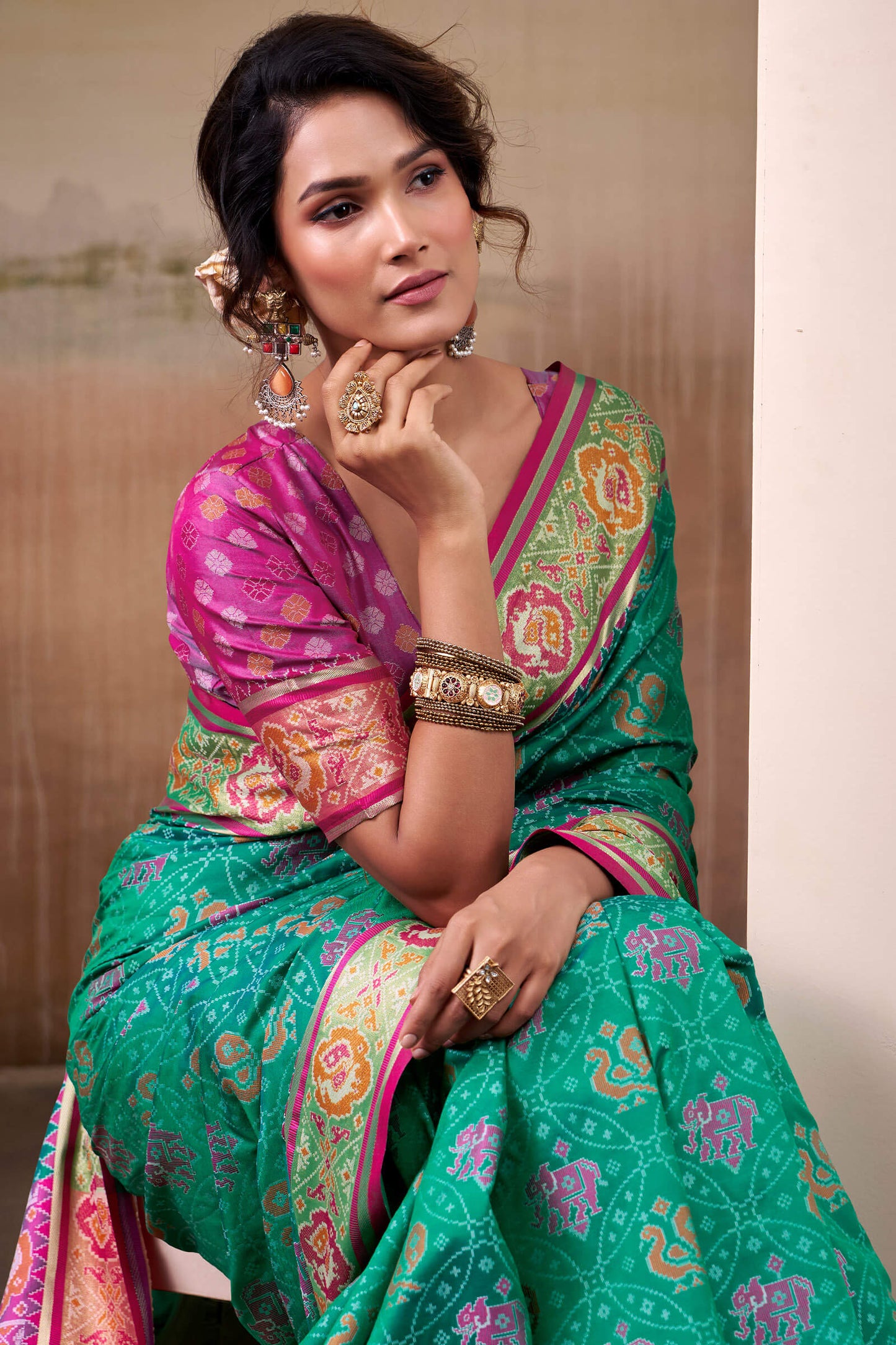 Radiant Rama Patola Silk Saree With Effulgent Blouse Piece