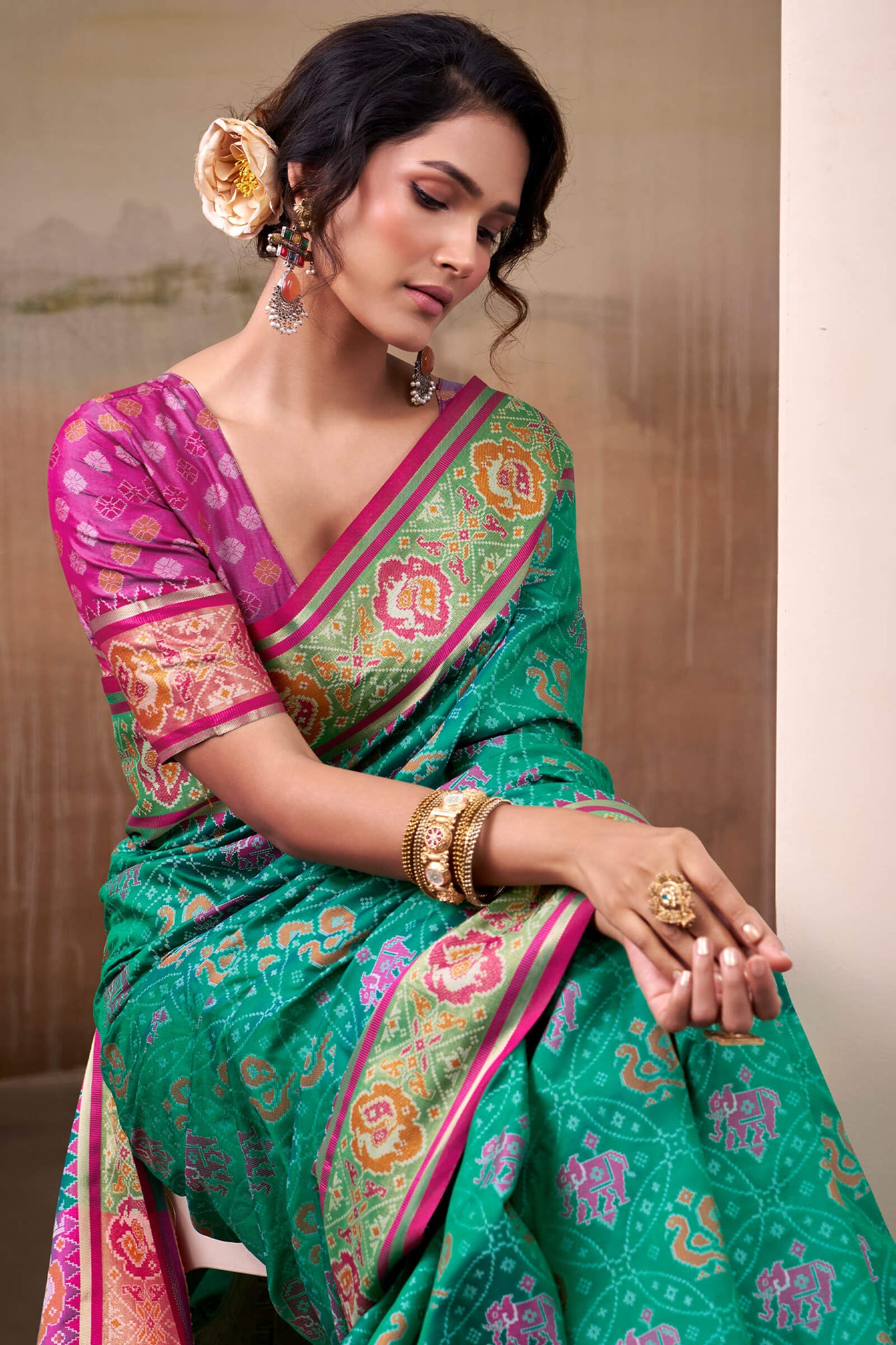 Radiant Rama Patola Silk Saree With Effulgent Blouse Piece