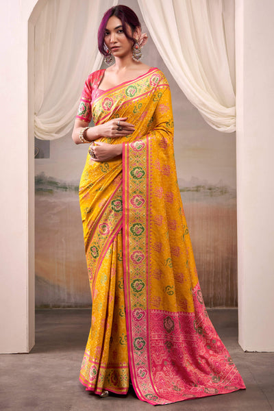 Lustrous Yellow Patola Silk Saree With Desirable Blouse Piece