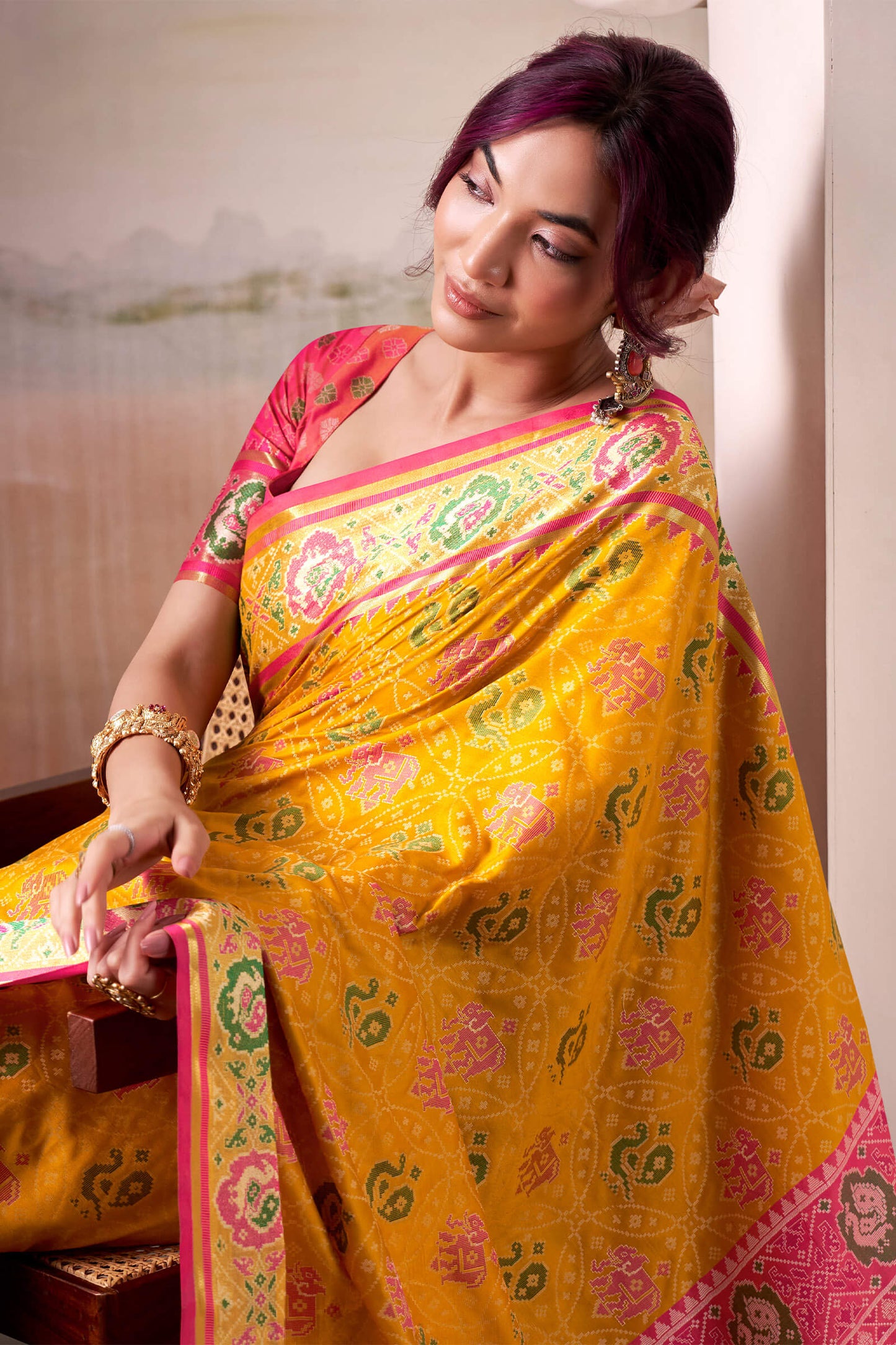 Lustrous Yellow Patola Silk Saree With Desirable Blouse Piece
