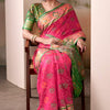 Amiable Pink Patola Silk Saree With Flamboyant Blouse Piece