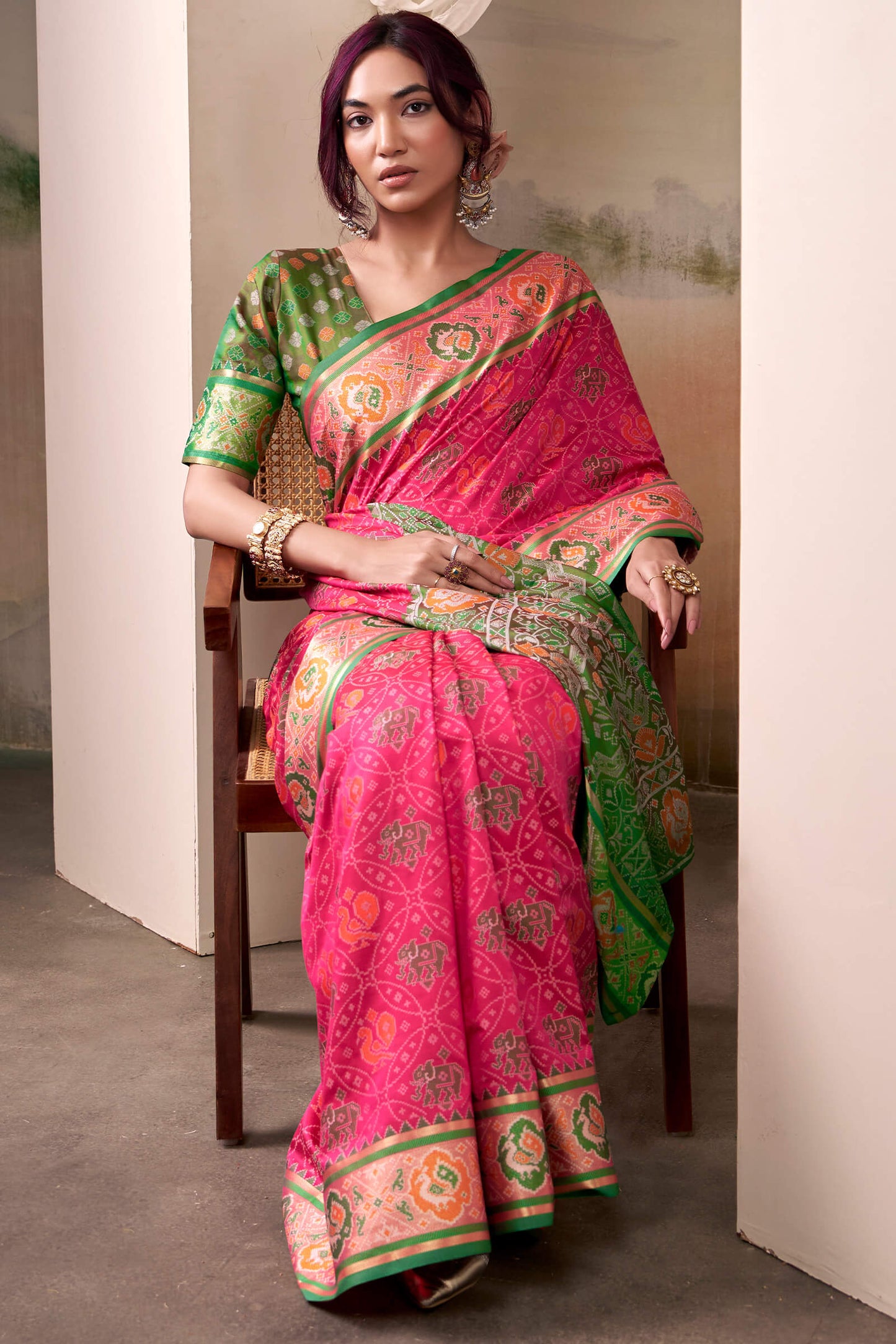 Amiable Pink Patola Silk Saree With Flamboyant Blouse Piece