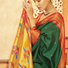 Ephemeral Dark Green Paithani Silk Saree With Precious Blouse Piece