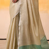 Entrancing Beige Soft Banarasi Tissue Silk Saree With Murmurous Blouse Piece