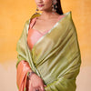 Precious Green Soft Banarasi Tissue Silk Saree With Unequalled Blouse Piece