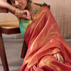Cynosure Pink Soft Banarasi Tissue Silk Saree With Energetic Blouse Piece