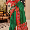 Denouement Dark Green Patola Silk Saree with Moiety Blouse Piece
