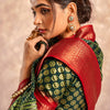 Enigmatic Dark Green Foil Printed Dola Silk Saree With Incomparable Blouse Piece