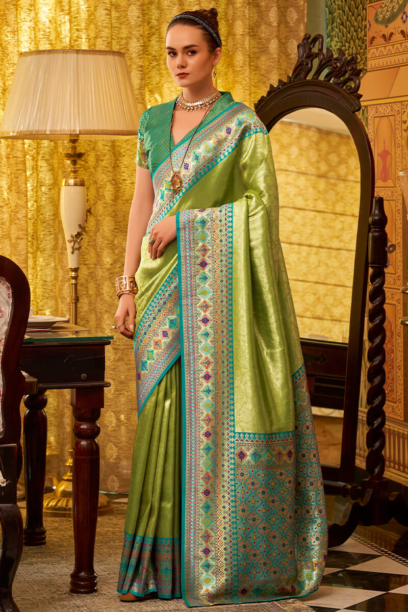 Dissemble Green Soft Banarasi Tissue Silk Saree With Elegant Blouse Piece