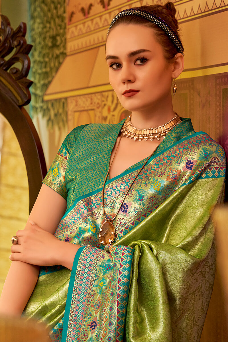 Dissemble Green Soft Banarasi Tissue Silk Saree With Elegant Blouse Piece
