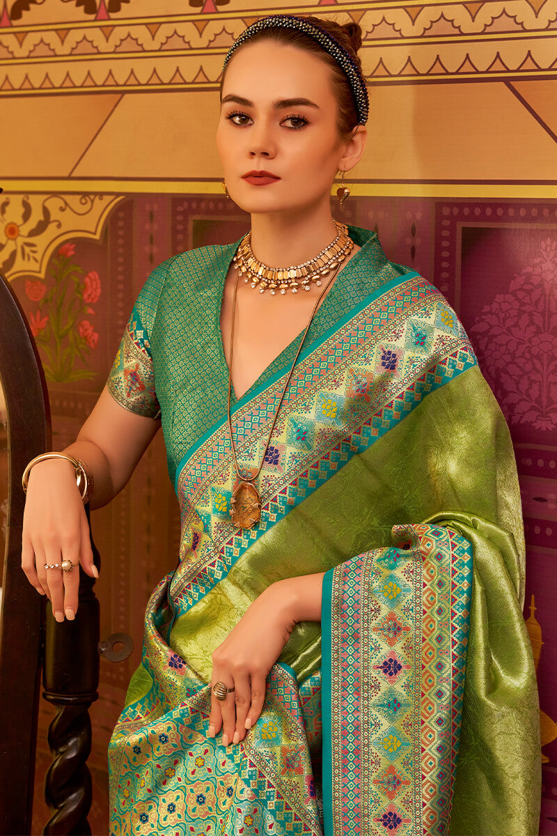 Dissemble Green Soft Banarasi Tissue Silk Saree With Elegant Blouse Piece