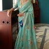 Intricate Firozi Soft Banarasi Silk Saree With Jazzy Blouse Piece
