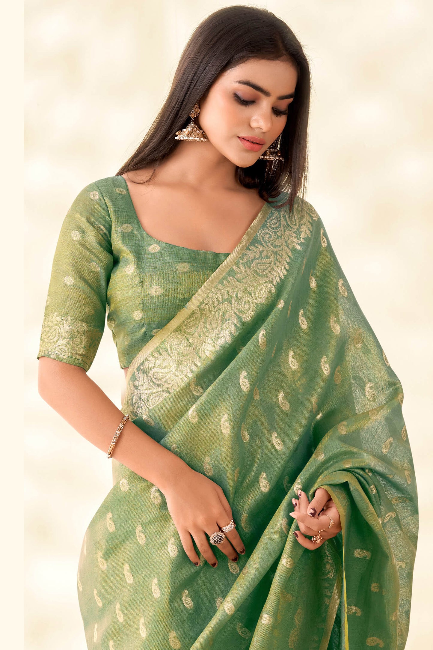 Felicitous Green Soft Banarasi Tissue Silk Saree With Pulsating Blouse Piece