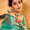 Outstanding Sea Green Soft Banarasi Silk Saree With Appealing Blouse Piece