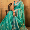 Outstanding Sea Green Soft Banarasi Silk Saree With Appealing Blouse Piece