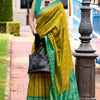 Scrumptious Mehndi Soft Banarasi Silk Saree With Splendorous Blouse Piece