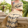 Sempiternal Beige and Grey Cotton Silk Saree With Confounding Blouse Piece
