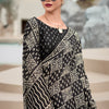 Cynosure Black Printed Mul Cotton Saree With Beleaguer Blouse Piece