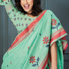 Cynosure Sea Green Cotton Silk Saree With Eloquence Blouse Piece