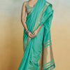 Lustrous Sea Green Cotton Silk Saree With Proficient Blouse Piece