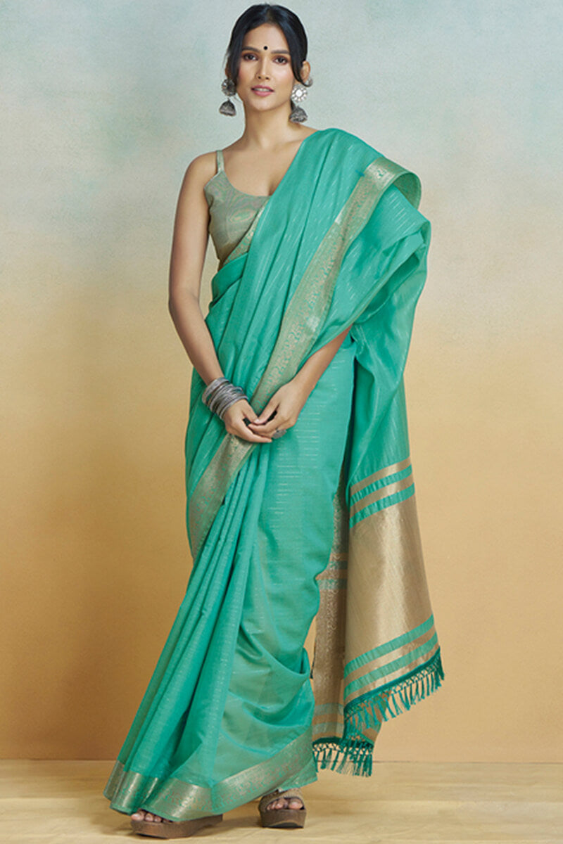 Lustrous Sea Green Cotton Silk Saree With Proficient Blouse Piece